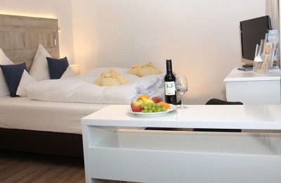 Bett und Wein in der Junior Suite