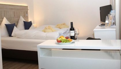 Bett und Wein in der Junior Suite