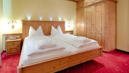 Bett im Böhmerwaldzimmer