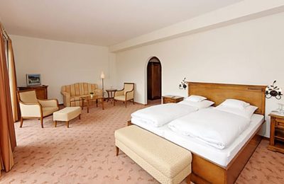 Bett in der Turmsuite Herrnmühle