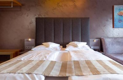 Bett im Kuschel-Doppelzimmer